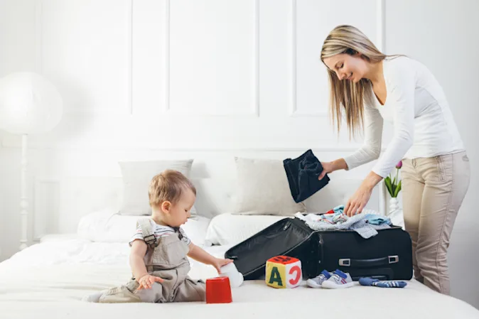  What do moms say is bad for both family trips and sleeping? image