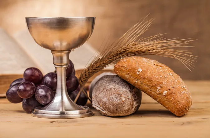 Why did the little boy take extra bread at communion? image