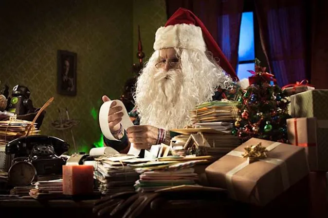  What does Santa call his wife at tax time? image