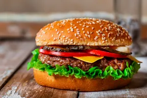 How do you make a hamburger laugh? image