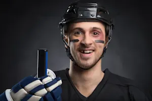 How do you warn a hockey player that he's about to be in trouble? image