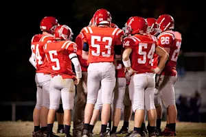 In football math, what is a quarterback worth more than? image