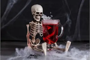 What did the skeleton order at the bar? image