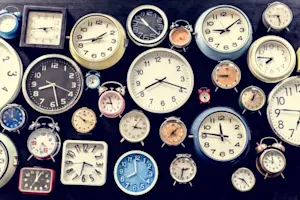 What do you call a belt made of clocks? image