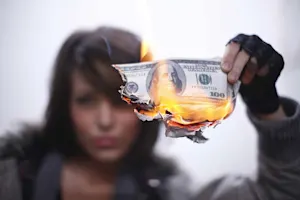 What do you call a woman who sets fire to all her bills? image