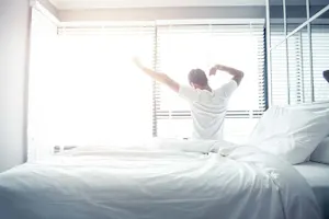 What might you call waking up in the morning? image