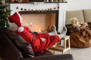 What's Father Christmas called when he takes a rest while delivering presents? image