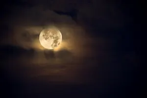 When do you know that the moon has had enough to eat? image