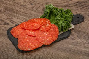 Where does the pepperoni go on vacation? image