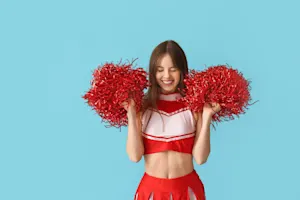 Why are cheerleaders so festive in December? image