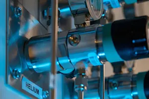 Why did Adam quit his job at the helium factory? image