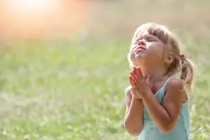 Why did the children think that prayer meant they would get more toys? image