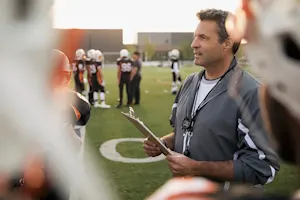 Why did the coach go to the bank? image