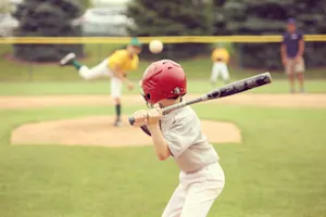 Why did the Little League® player run to the park during his time at bat? image