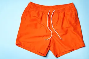 Why did the man bring his swim trunks to the bar? image