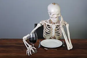 Why did the skeleton attend the backyard barbecue? image