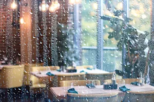 Why does rain make a great waiter at a restaurant? image
