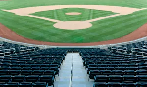 Why does the lower first base side smell the worst at a baseball stadium? image